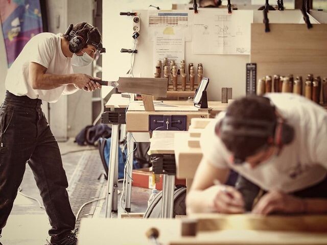 carpenter cutting wood
