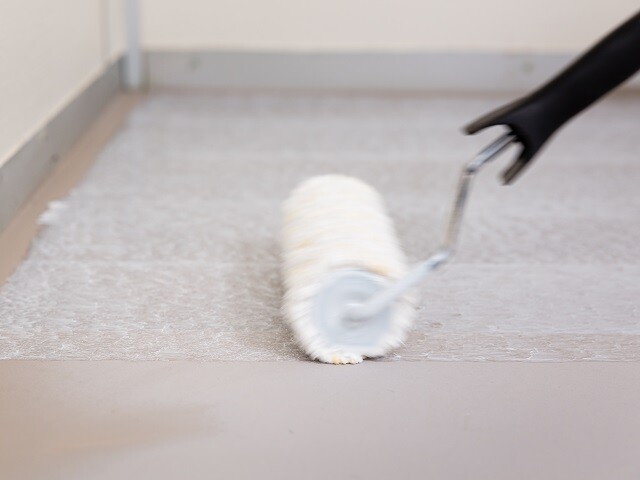 BEFORE LAYING DOWN CARPET TILES WITH ADHESIVES