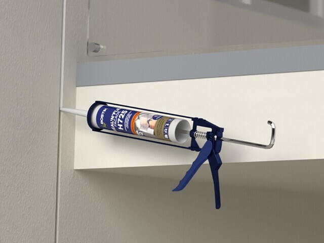 Hybrid Sealant being applied to a window joint