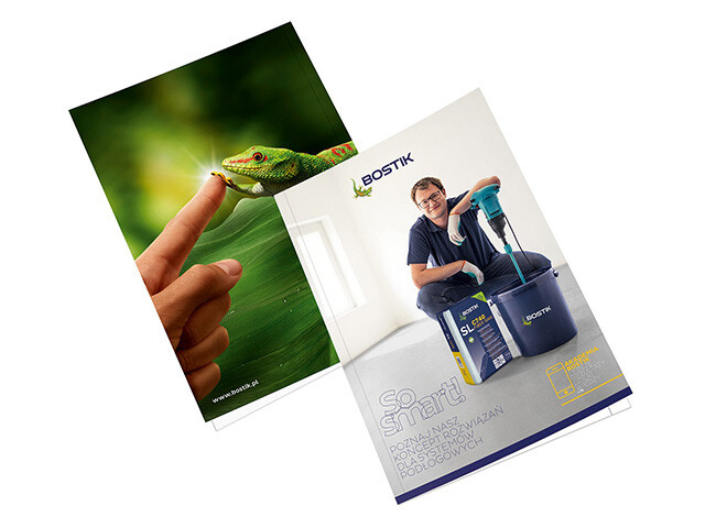 Bostik PL Wall and floor catalogue cover image with man in Bositk shirt kneeling with bostik products