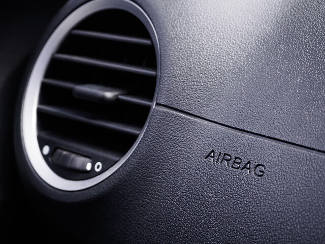 Smart adhesive films for airbags 