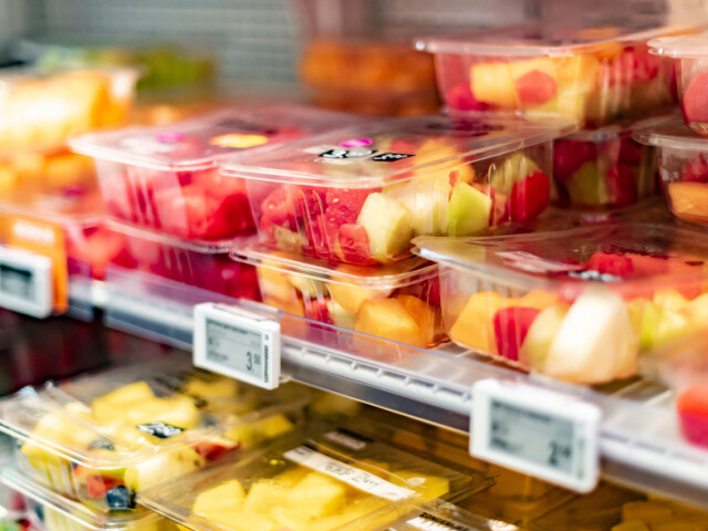 fruit on shelves in a grocery store