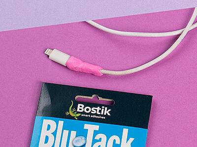 Protect phone cord with Blu Tack